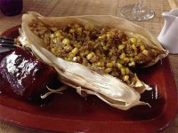 Corn and quinoa tamale, salsa, sticky pork belly (unveiled)