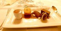 Assiette of Chocolate including white chocolate vanilla cream, dark chocolate sorbet and a macaroon with caramel glaze