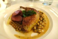 Confit chicken with sausage and haricot beans