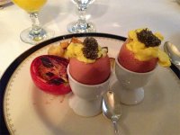 Eggs Isabella - soft scrambled eggs, mixed with truffles, served in the shell with of caviar at the Lowell. 