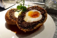 Huevo Criollo, Burford Brown egg, quinoa, sangrecita sausage, rocoto sauce