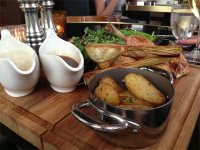 Roast whole Goosnargh chicken, bread sauce, caramelised garlic, roasted Cornish potatoes (for 2)