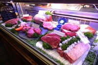 The meat laid out at the entrance to the restaurant