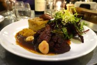 Oloroso marinated onglet, with celeriac and horseradish gratin, greengage chutney, hijiki and bone marrow jus