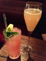 Corner Colins (gin, lemon juice, rhubarb jam, campari, soda) and All Pear (ginger liqueur, spiced pear puree, lemon juice, champagne)