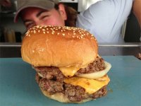 Bleecker Street Burger - Double Cheeseburger, two aged beef patties with American cheese, onions and special sauce on toasted bun.
