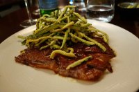 Saltimbocca with cheese and fried zucchini