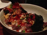 Duck chirashi with kimchi, aioli and scallions at Chez Sardine