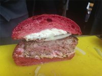 Apero UnBEETable Burger - aged beef patty with stracciatella cheese, beetroot mayonnaise, pancetta, white onion and lettuce on poppy seed beetroot bun