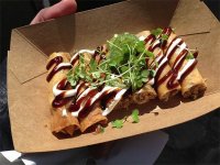 Slow braised pork belly and shoulder, chives and greenmarket ramps spring rolls at Lumpia Shack at Brooklyn's Smorgasburg