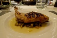 Rabbit leg with summer onions and pecorino