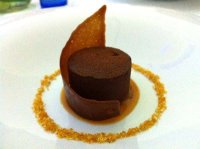 Chilled chocolate fondant sat on a praline base with a soft salted caramel centre