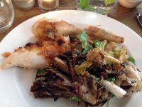 Rotisserie Sutton Hoo chicken with grilled bitter leaf bread salad