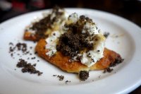 Tolosa biscuits with whipped cheese and black olives