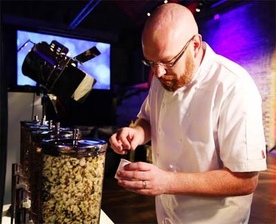 Simon Hulstone launches Mary Poppins popcorn at BA's rooftop Cinema.