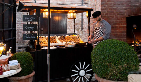 Nuno Mendes sets up his oyster cart outside Chiltern Firehouse