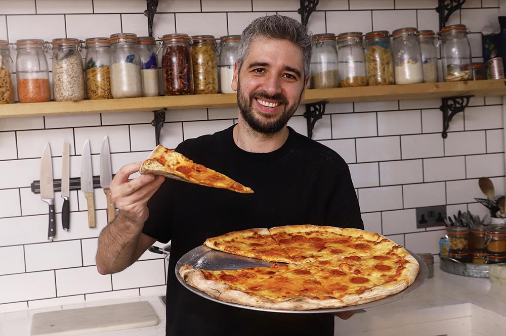 Miguel's Pizza offers pizza by the slice from One Pound Meal's Miguel Barclay