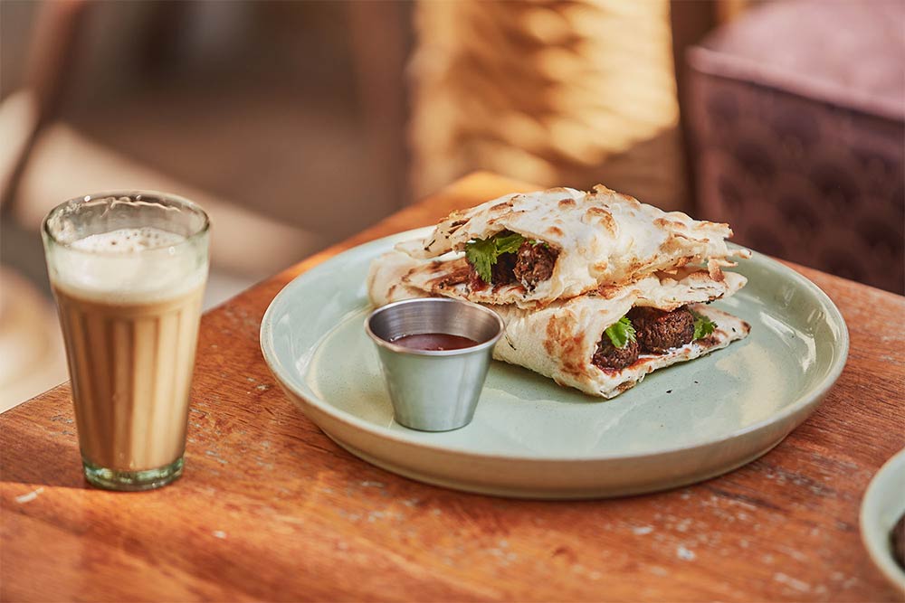 Dishoom launch a vegan version of their naan kit - the vegan sausage naan roll