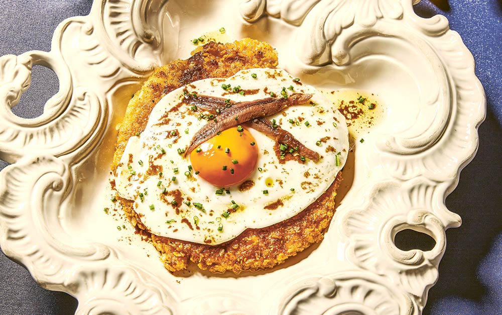 Carl Clarke recipe - Doritos-coated schnitzel with fried eggs and anchovies