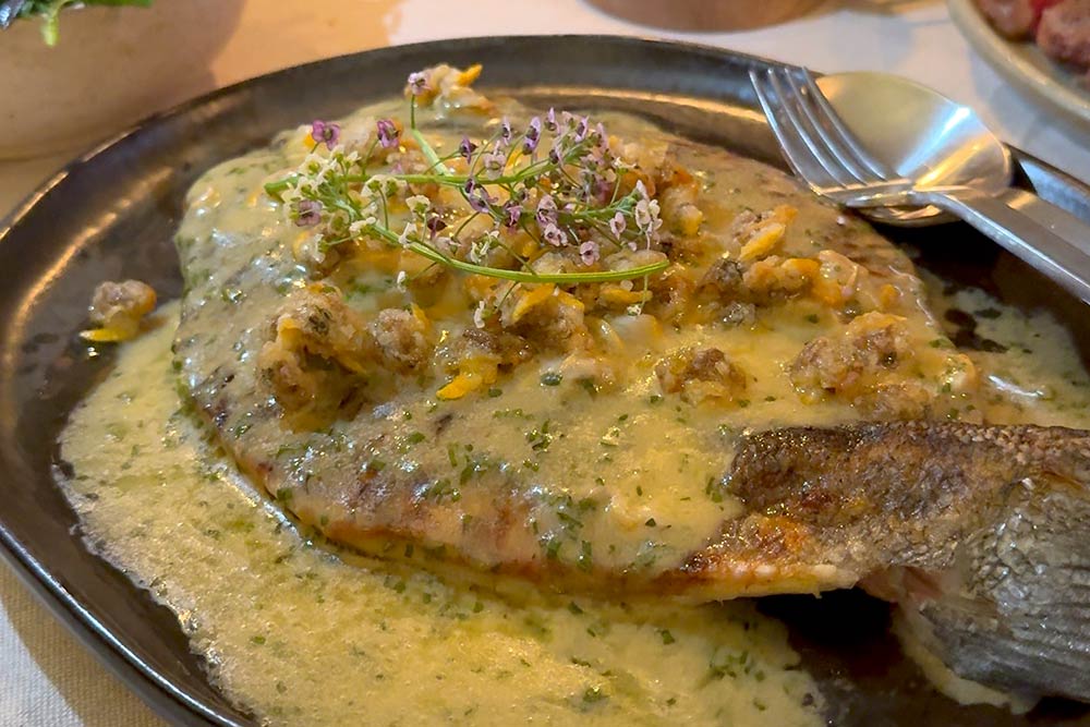 Crafted at Powdermills (Battle) - Seabass with smoked butter sauce and devilled cockles