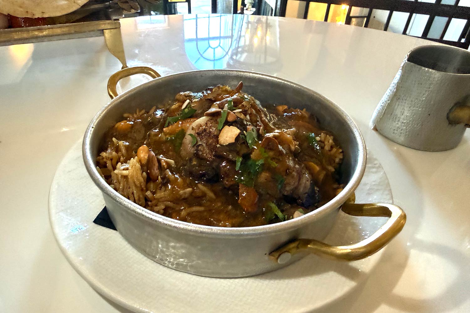 Kinz  (Notting Hill) - Slow-cooked chicken on spiced rice with minced lamb mixed nuts