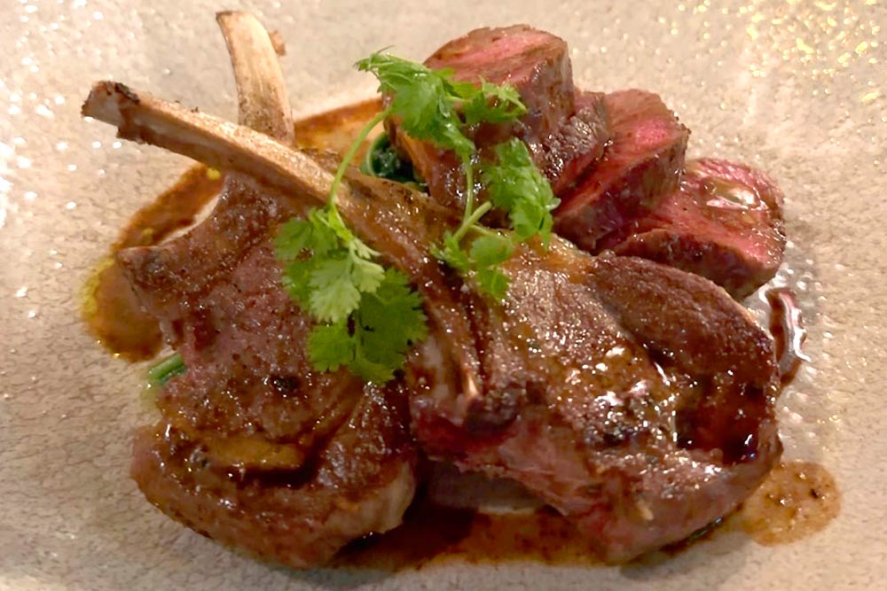 The Universal (Galway, Ireland) - Kingara roast lamb with petit pois, chervil, wild garlic, cepe and lamb jus.