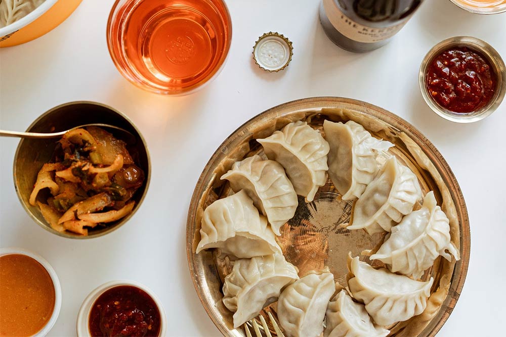 Eat Momo at The Coach & Horses