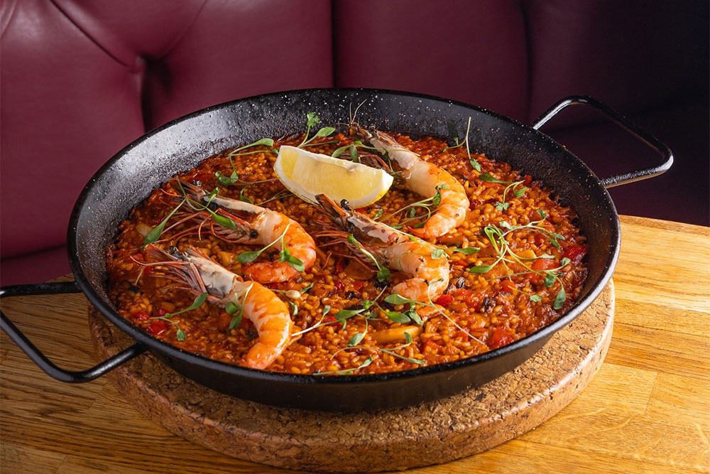 Get 50% off paellas on the rooftop at La Rueda in Clapham