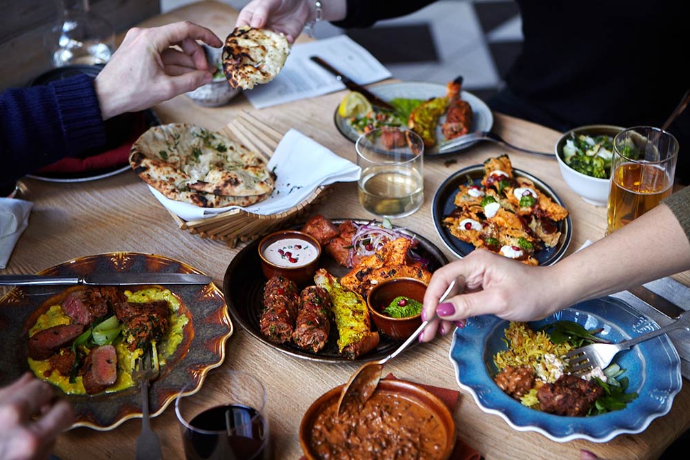 Enjoy bottomless dhal and naan when dining at Cinnamon Kitchen Battersea