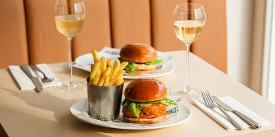 Get a free glass of Champagne or dessert (per person) at Milk Burger in Notting Hill