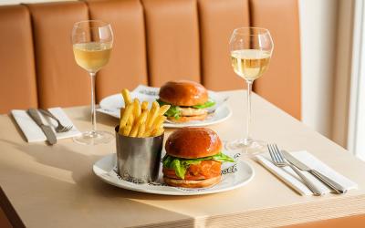 Get a free glass of Champagne or dessert (per person) at Milk Burger in Notting Hill